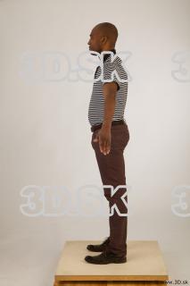 Whole body black white striped shirt brown jeans brown shoes…